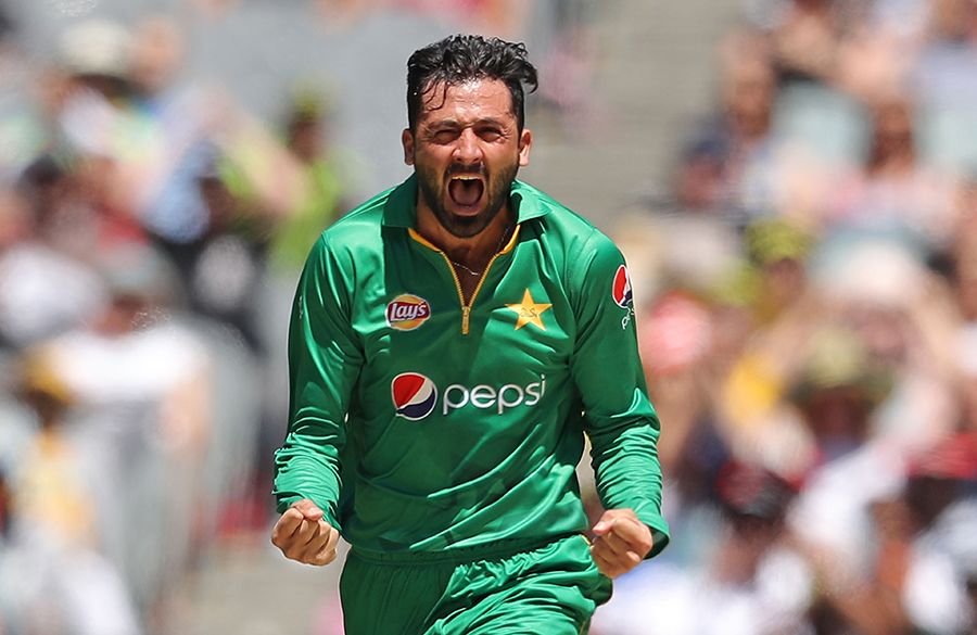 Junaid Khan celebrates after taking a wicket